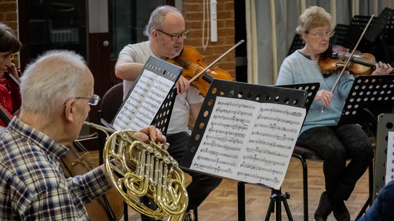 Horn amd two violinists undefinedHorn amd two violinists